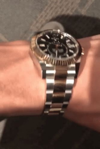 guy flexing rolex gif.